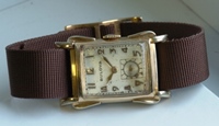 Flared case Bulova Ambassador winder circa 1953